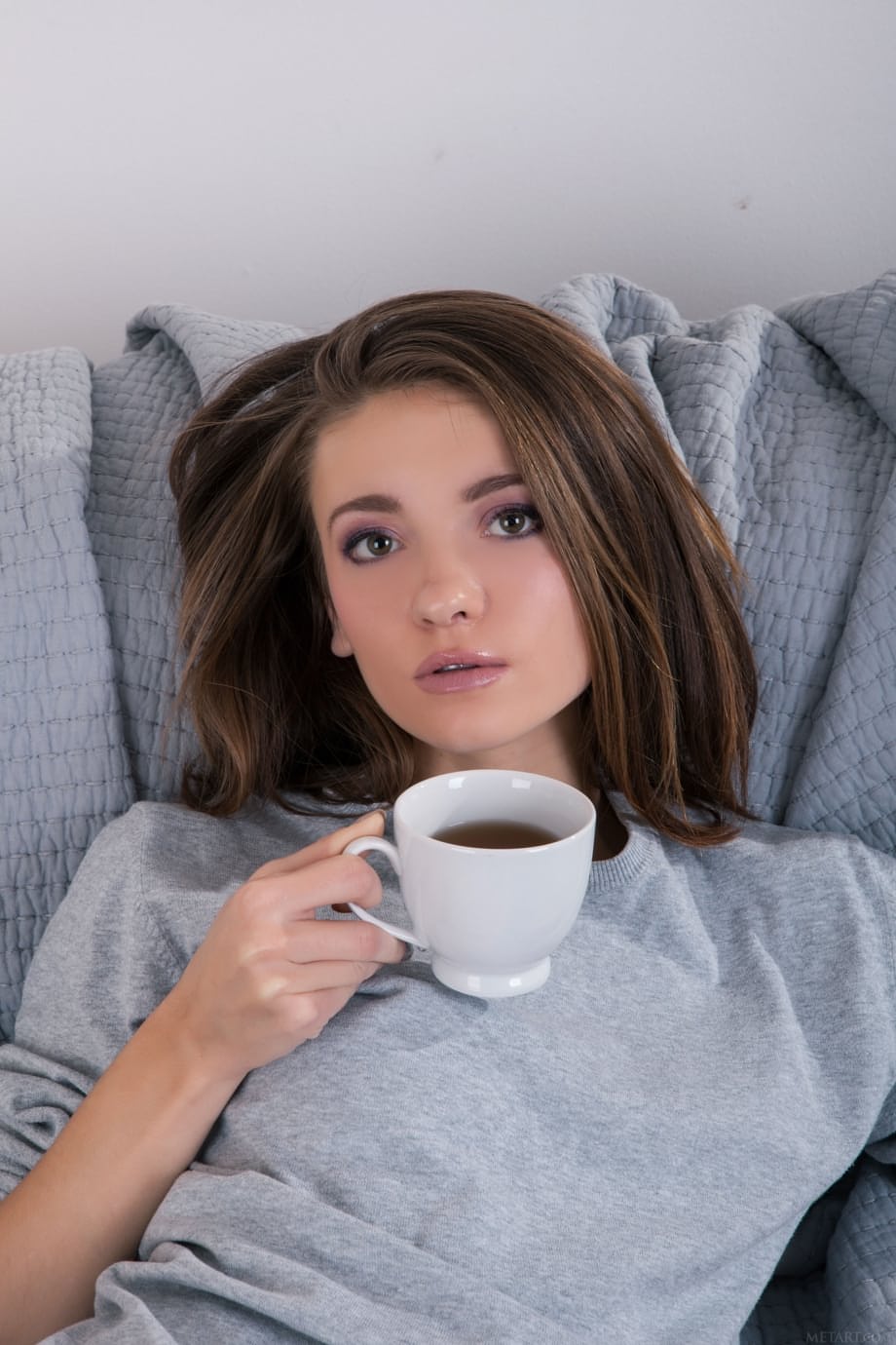 Latvian teen babe Eliav strips & spreads her pussy while drinking a coffee
