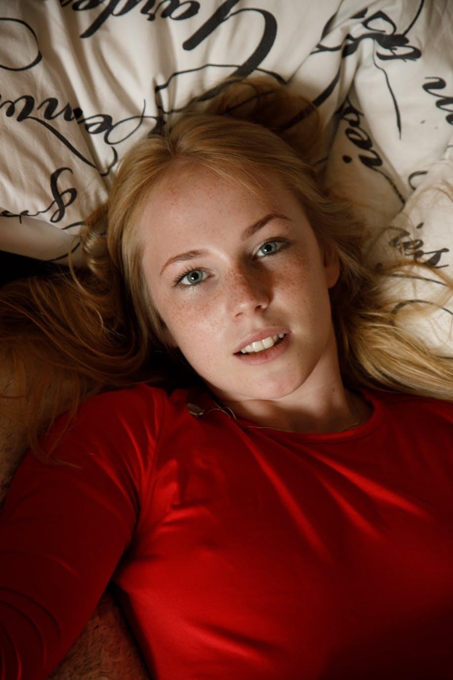 Petite blonde teen Rune Kimele shows her small booty and tiny tits too